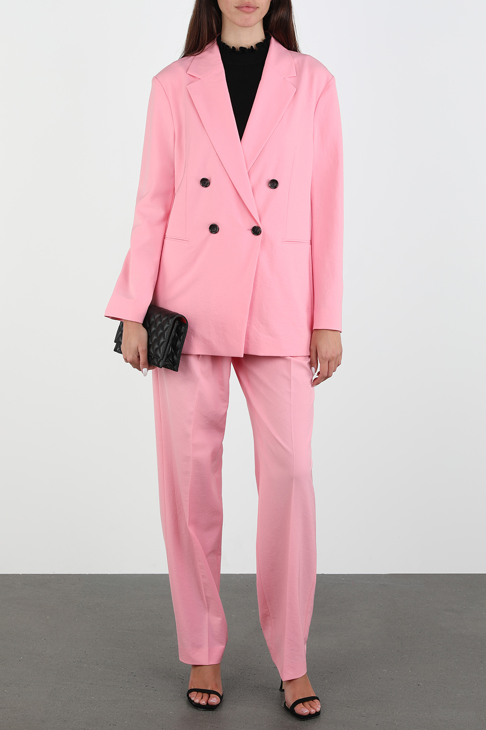 Francoise Frill Neck Ribbed Sleeveless Sweater In Black